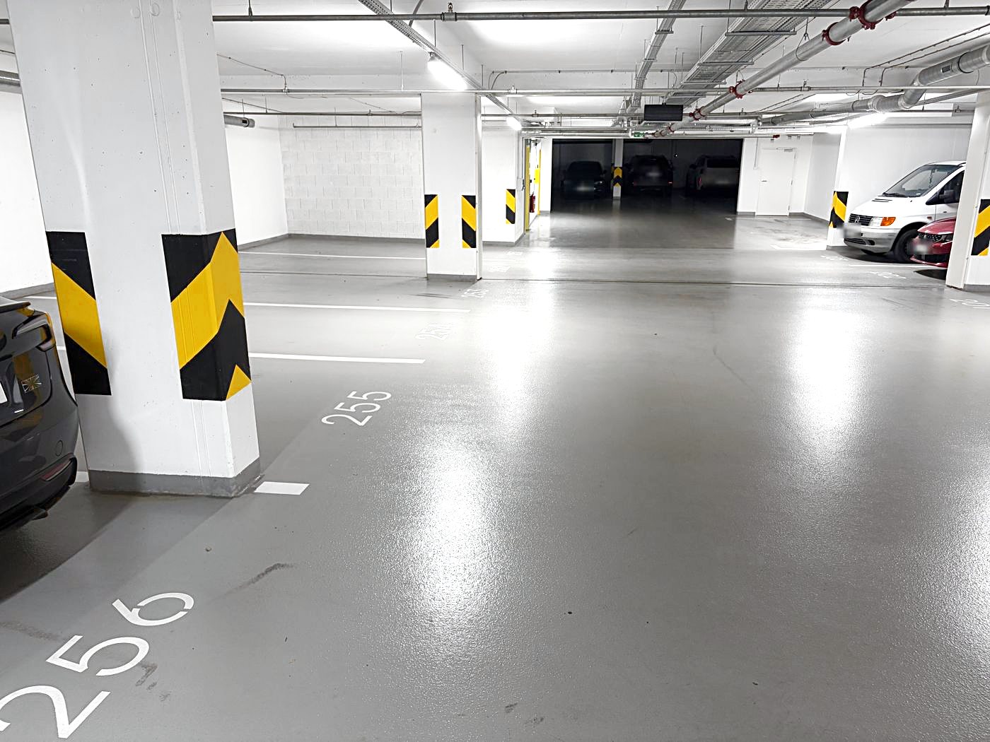 At the bottom of the ramp on level −2 turn left twice straight away and look for